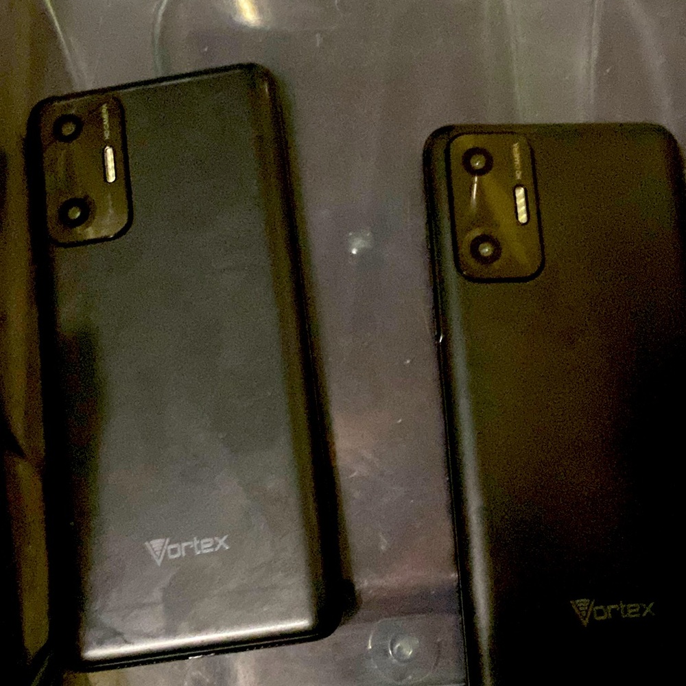 two phones trying to get out of my hands.